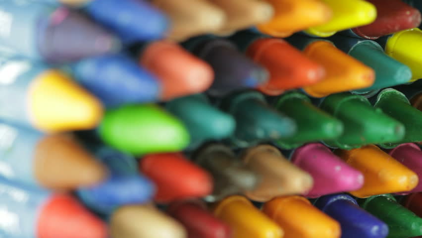 wax crayons coming into the frame selective focus