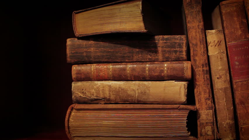 Ancient books in a bookshelf