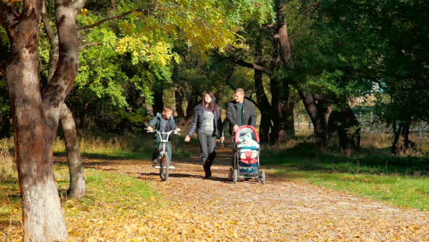 family walking in park