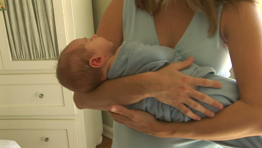 Mother holding newborn