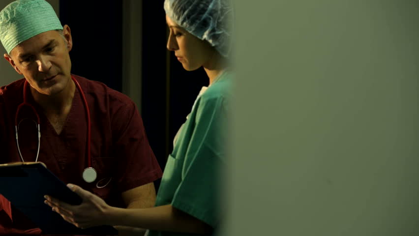 Surgeon giving instructions; HD Photo JPEG
