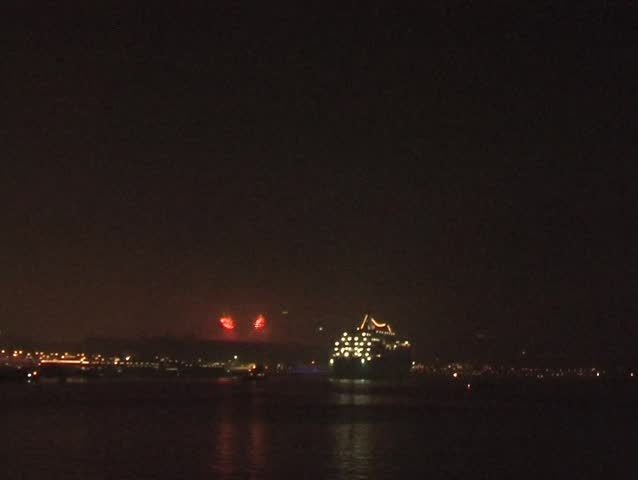 Amsterdam harbor at New Year's eve in the Netherlands with cruiseship coming in