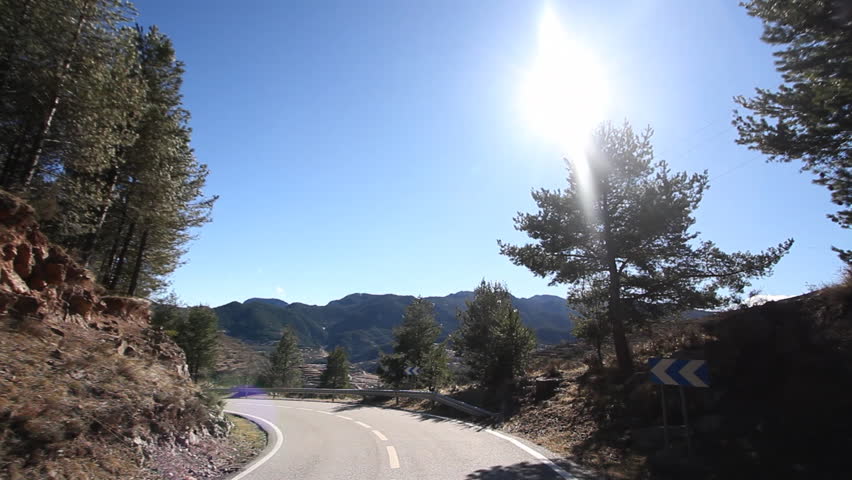 shot from a moving car with the camera clamped to the roof, pyrenees, spain