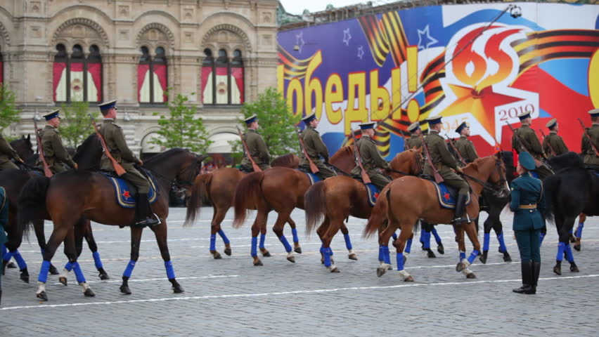 MOSCOW - MAY 6: Horsemen in uniform and high ranking soldiers near GUM participate in rehearsal in honor of Great Patriotic War victory on Red Square on May 6, 2010 in Moscow, Russia.