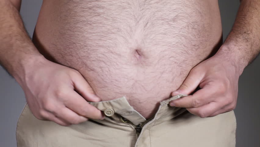 Fat man with a big belly can't button pants