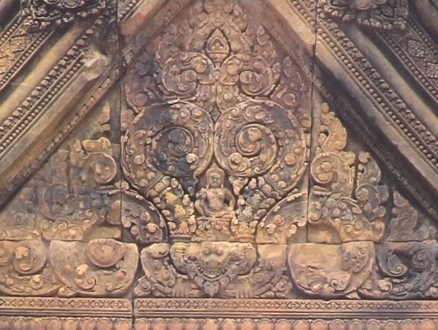 intricate carvings in the temple of Bantei Srei, Angkor complex, Cambodia.