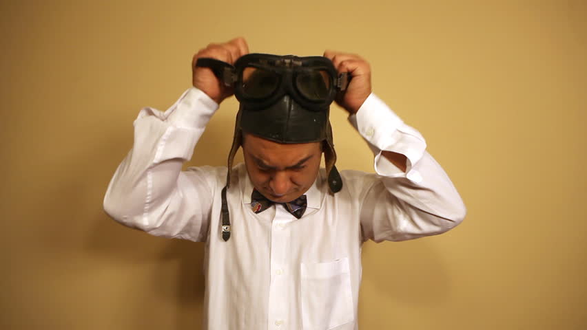 Comedian wearing bow tie acting as pilot - Humor - Fun - Childish 