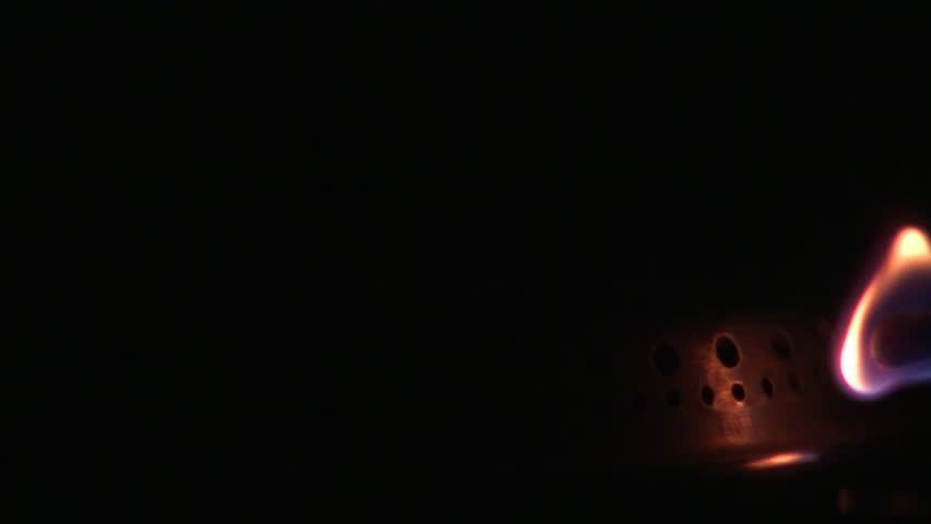 HD 1080i: Match lighting a burner of a gas stove