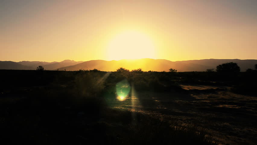 windy sunset time lapse on mountain
