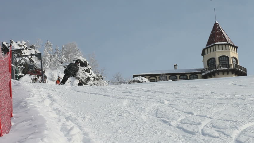 Snowboarding in mountains. Extreme carving.