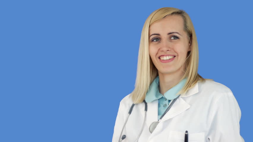 Female doctor taking pill on blue background 