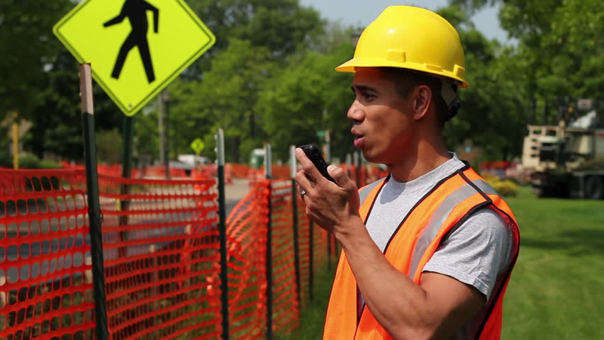 Construction worker giving directions