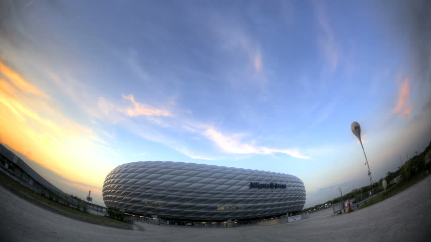 MUNICH, GERMANY - APRIL 23: Timelapse of Allianz Arena, April 23, 2011 in Munich, Germany. Allianz Arena is the first stadium in the world that has a full changing color outside.