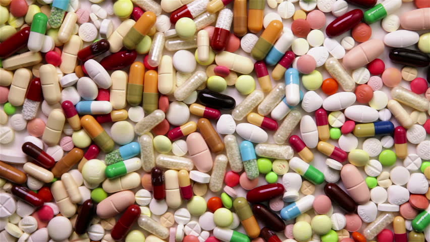 Zooming out of many different turning pills (Full HD)