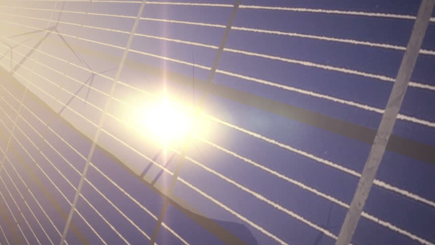 camera pan of solar panels and wind turbines in the desert. 1080p