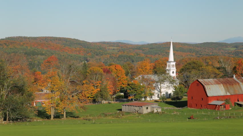 Slow pan on a late autumn afternoon of a church and farm in Peacham, Vermont.