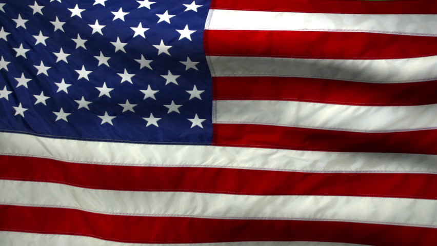 United States flag in green screen, zoom out from a star and flag waving.