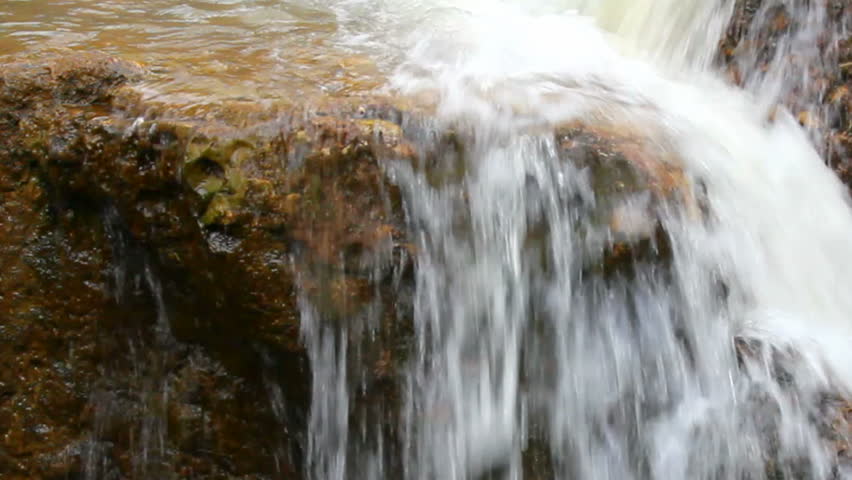 waterfall among rocks close-up