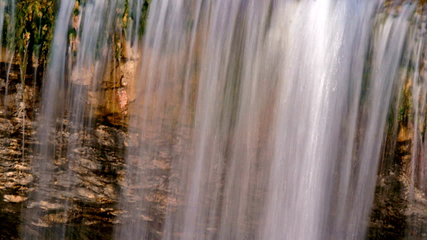 Waterfall and lake Zarecki krov with the trees, shot with the tracks