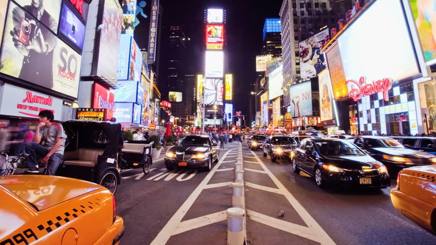 NEW YORK CITY - MAY 7: (Timelapse view) Busy nightlife at Times Square, May 7, 2011 in New York, New York. Times Square has become an iconic symbol of New York City and the United States.