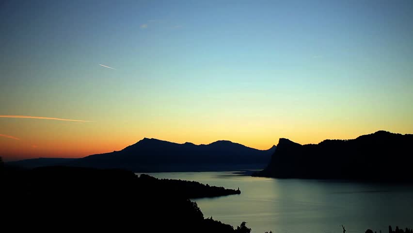 Sunrise at swiss mountains with lake lucerne in front