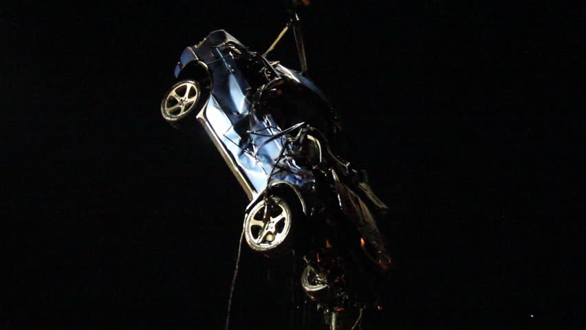 car was pulled from the river and laid on the surface