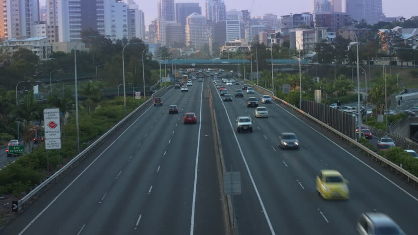 City freeway in timelapse. Day to night. (Zoom to CBD)