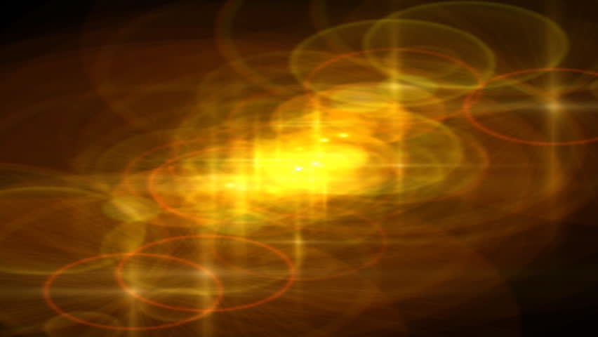 Golden rings of light swarm a black screen.
