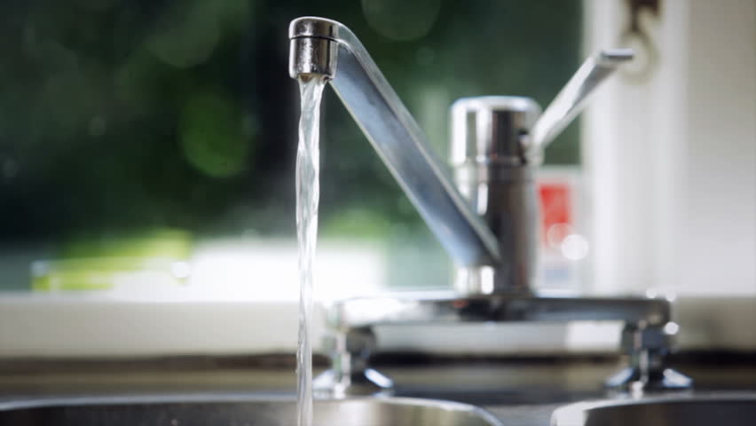 Filling a glass of water