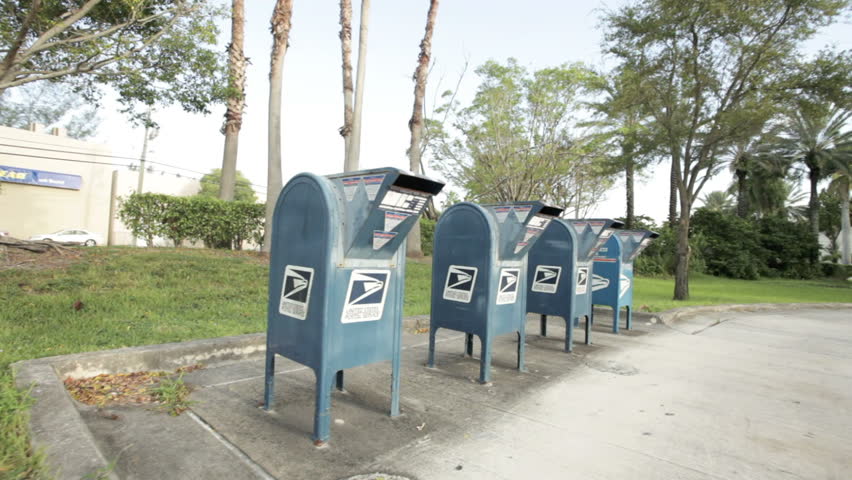 MIAMI, FLORIDA - OCTOBER 3: USPS post drop of boxes October 3, 2011 in Miami. The USPS is struggling to stay financially afloat; The agency recently announced it will likely close thousands of offices nationwide, many of which reside in rural areas.