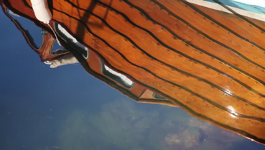 Boat reflection in water Full HD