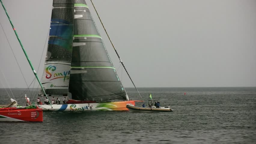 ALICANTE, SPAIN - OCTOBER 7: Groupama and Sanya Team, two of the six teams participating in the race around the world "Volvo Ocean Race 2011-2012" begin their preparation in the first inshore race, October 7, 2011, Alicante, Spain.  