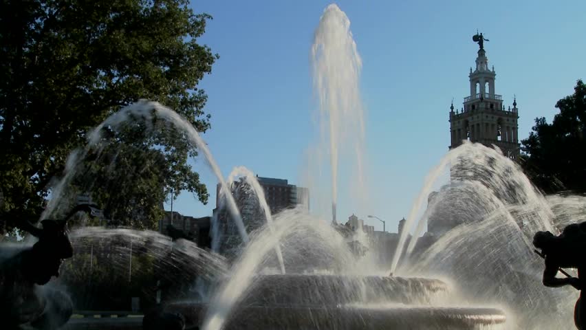 A downtown fountain in Kansas City with buildings background.