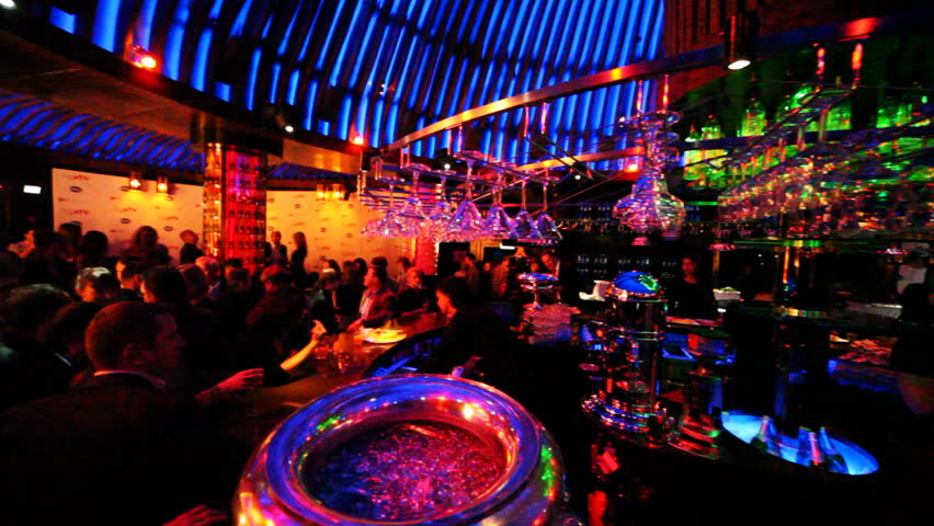 MOSCOW - FEBRUARY 1: People in club Imperia Lounge near lighted bar with different colors in celebration of second month of broadcast music channel Europa Plus TV on February 1, 2011 in Moscow, Russia.