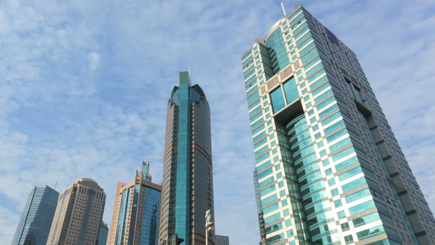 the LuJiaZui financial center in Shanghai, China. time lapse clouds.