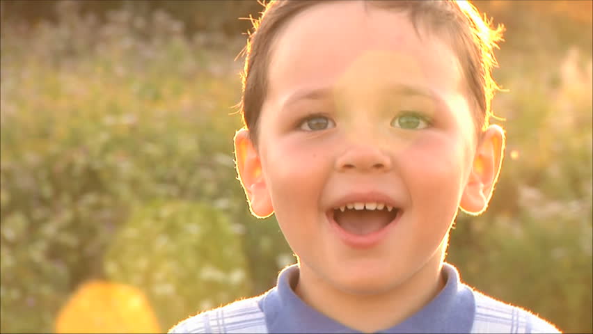 small happy boy laughing