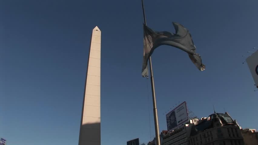 Buenos Aires, Argentina  capitol Nuevo de Julio buildings obelisk and Argentine flag