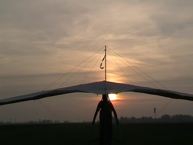 Hang glider in the sunset
