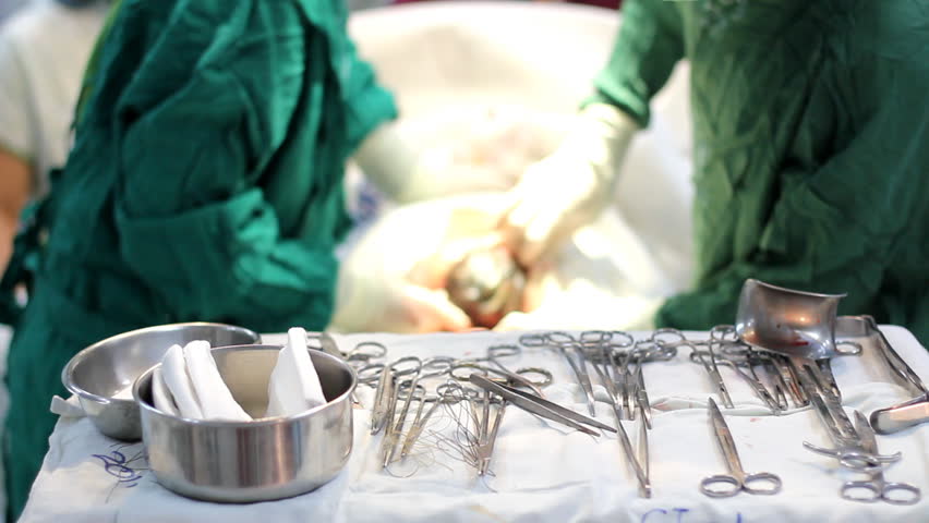 Newborn baby via caesarian section. Defocused