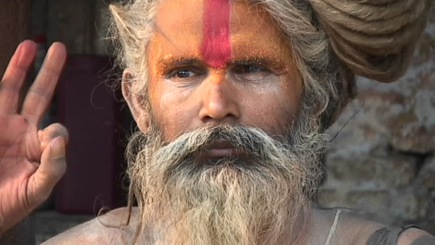 KATHMANDU, NEPAL - CIRCA 2005: Hindu Sadhus chanting with religious hand gesture at Pashupati Temple circa 2005 in Kathmandu.