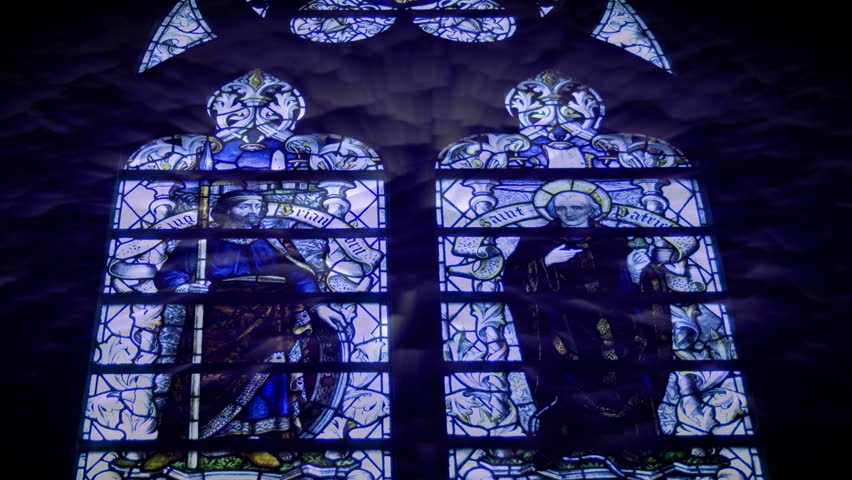 Abstract sun rays shining through stained glass windows. HD 1080i