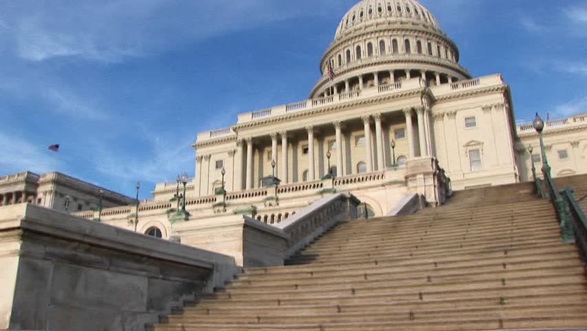 Looking up the steps of the U.S. Capitol building in Washington, DC to its landmark dome.