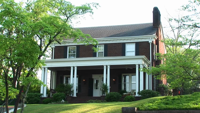 Colonial revival home with shaded porch
