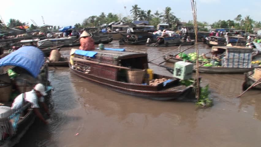 VIETNAM - CIRCA 2009: A market floats along river circa 2009 in Vietnam.