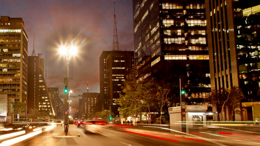 SAO PAULO, BRAZIL - JUNE 29: (Timelapse View) Cars race home at rush hour on Avenida Paulista, June 29, 2011, Sao Paulo, Brazil.