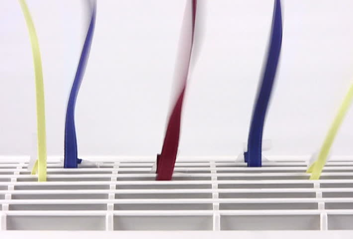 Close up of an air purifier with colorful streamers attached. Converted to NTSC from HDV 1080i60.