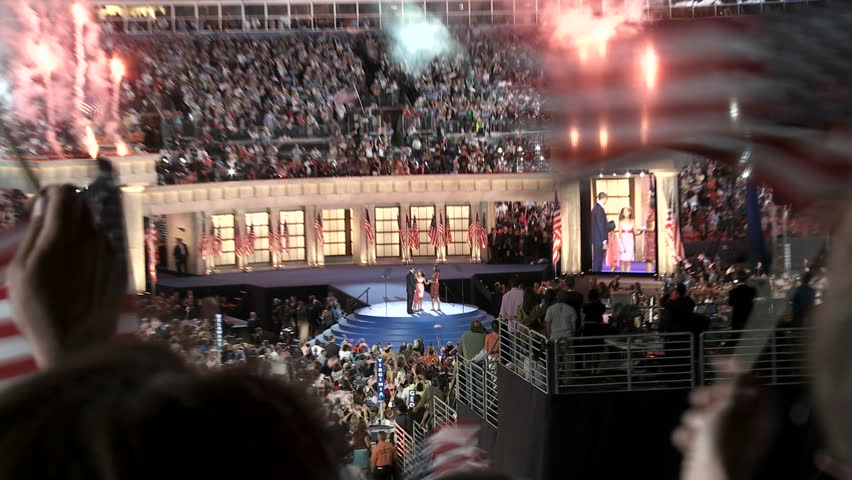 DENVER, COLORADO - CIRCA 2008: Presidential nominee Barack Obama greets his Vice Presidential pick Joe Biden in Denver, Colorado. People clap and cheer.