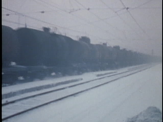 RUSSIA - CIRCA 1970: Siberian peasant workers build a railroad in the snow in this archival shot from the former Soviet Union in Russia circa 1970