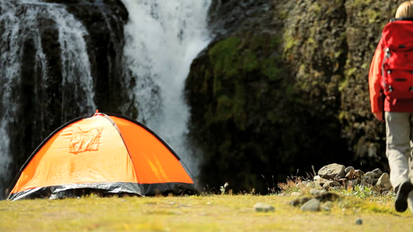 Lone Hiker Returning to Expedition Tent