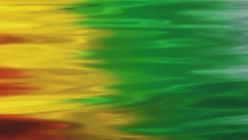 Rainbow-hued water as result of a reflection of a colorful boat's hull.  Green and yellow with a tinge of red.